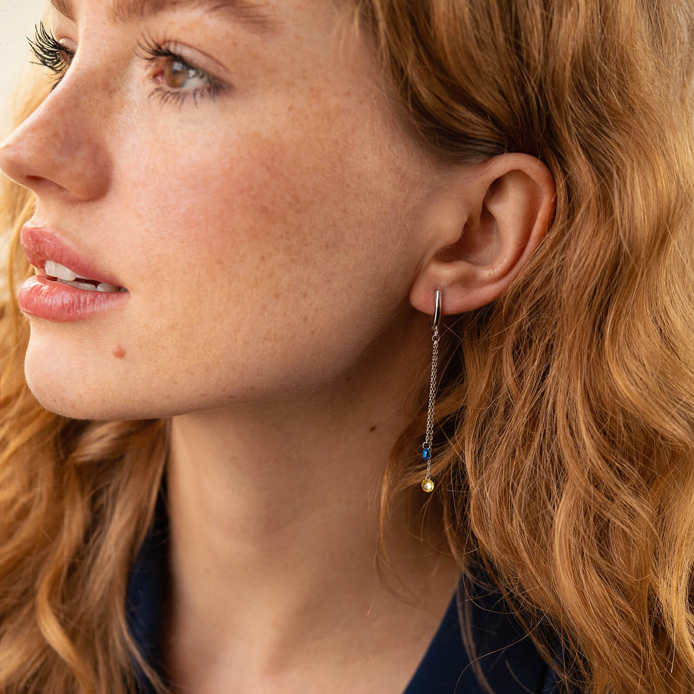 Dangling Gold Earrings "Ukrainian" (blue and yellow cubic zirconia)