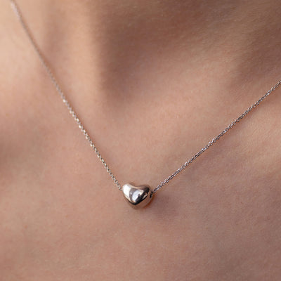 Gold necklace with a heart