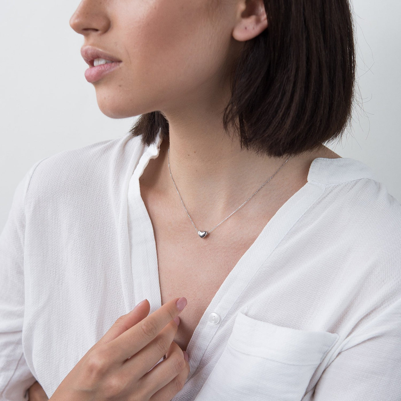 Gold necklace with a heart