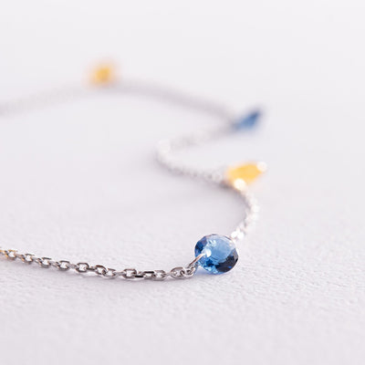 Gold anklet "Ukraine" (blue and yellow cubic zirconia)