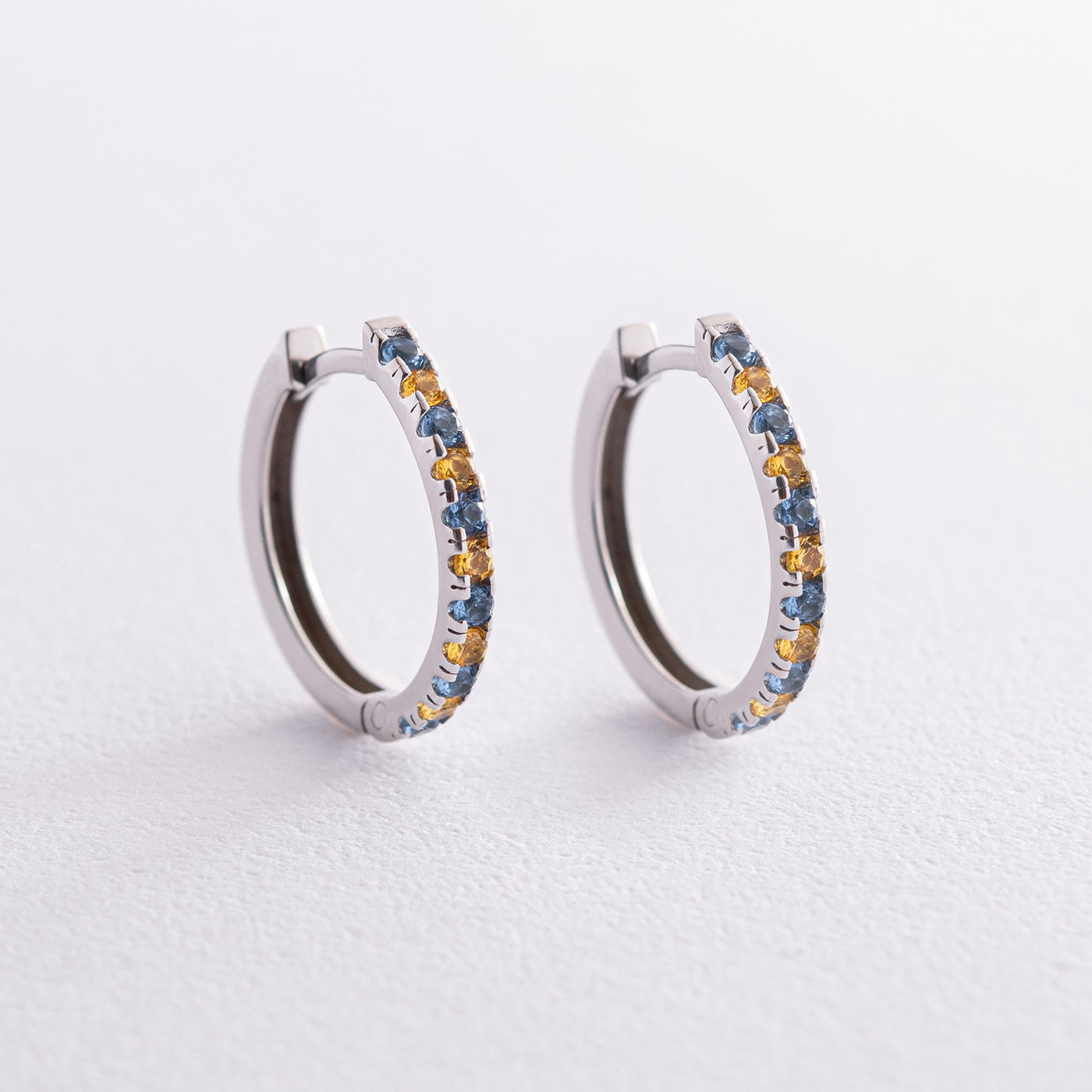 Silver Hoop Earrings (blue and yellow cubic zirconia)