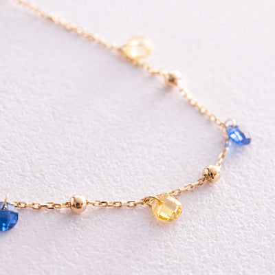 Gold Bracelet "Independent" with balls (blue and yellow cubic zirconia)