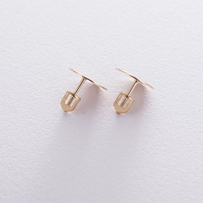 Gold stud earrings