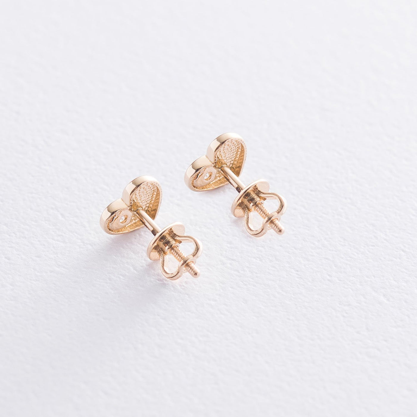 Yellow gold heart earrings with cubic zirconia