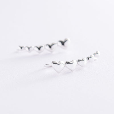 Silver heart climber earrings