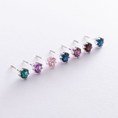 Silver stud earrings  (synthetic London topaz)