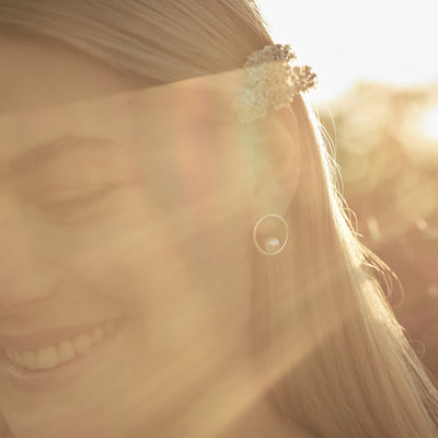 Silver circle stud earrings with pearls