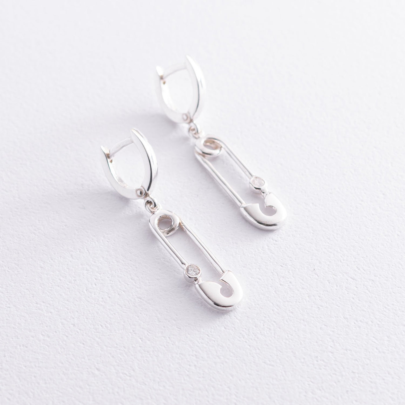 Silver pin earrings with cubic zirconia