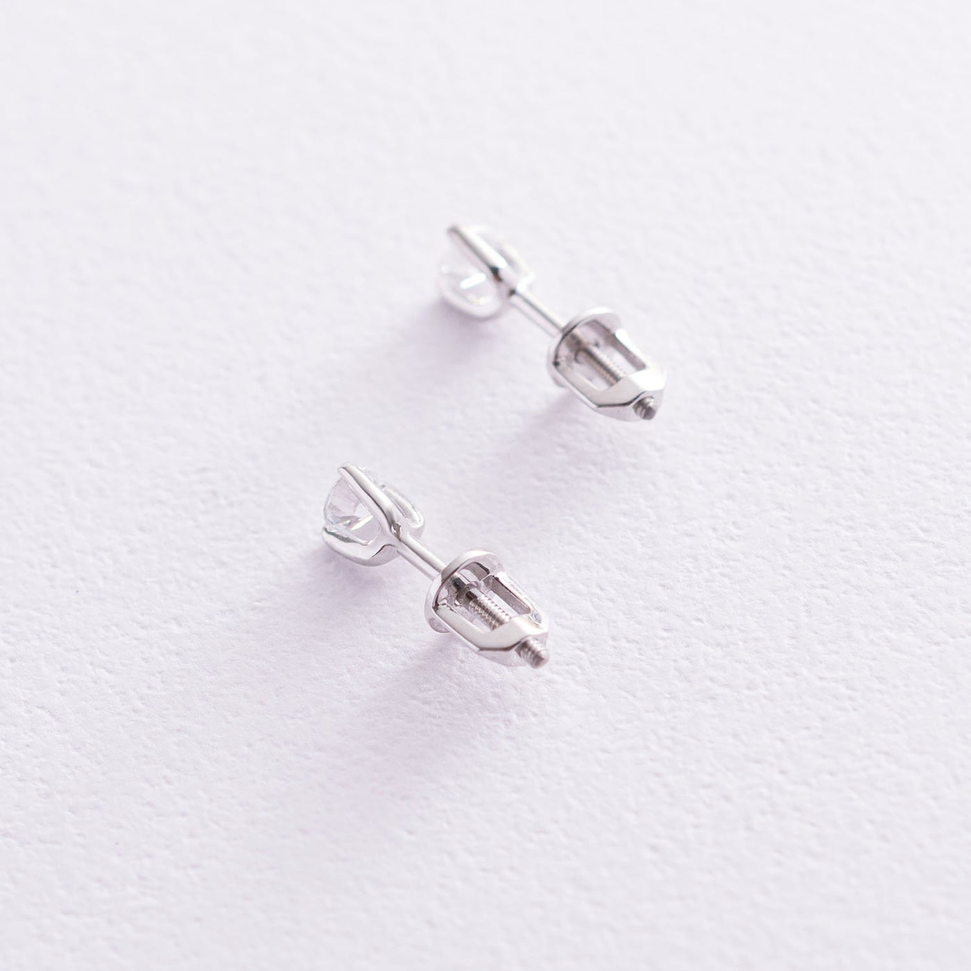 White gold stud earrings with cubic zirconia