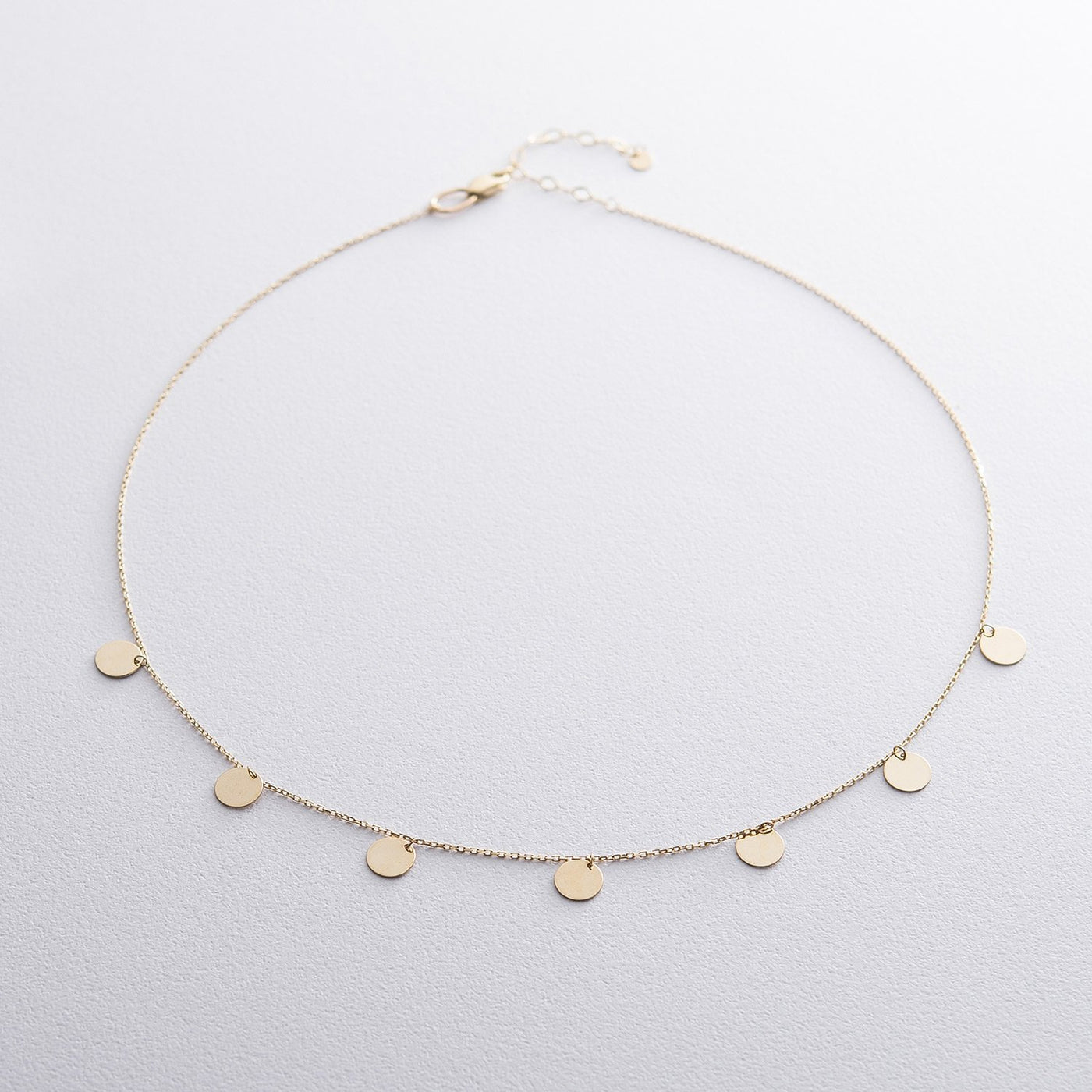 Gold necklace with coins