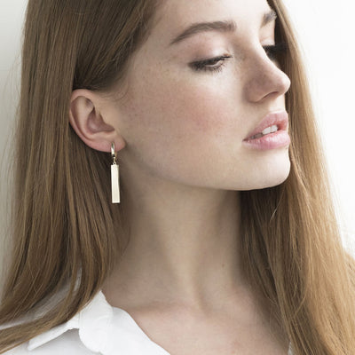 Gold leverback earrings