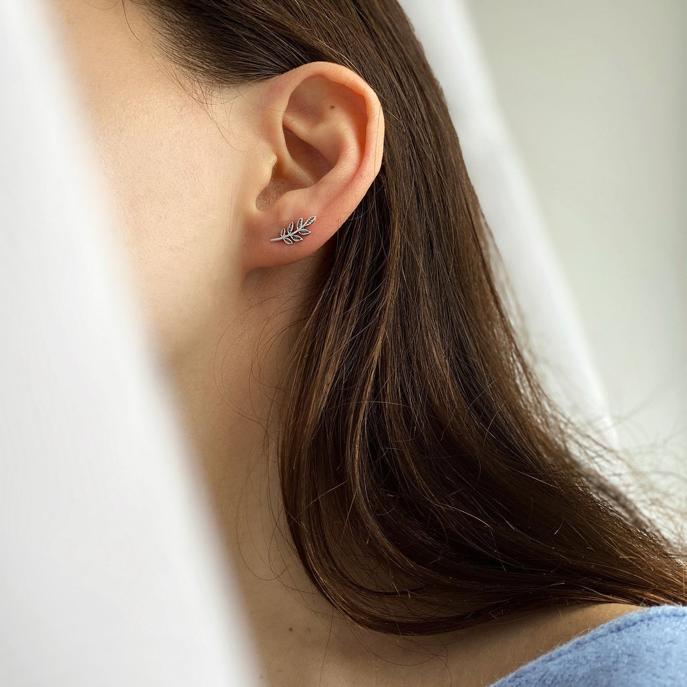 Silver stud leaves earrings