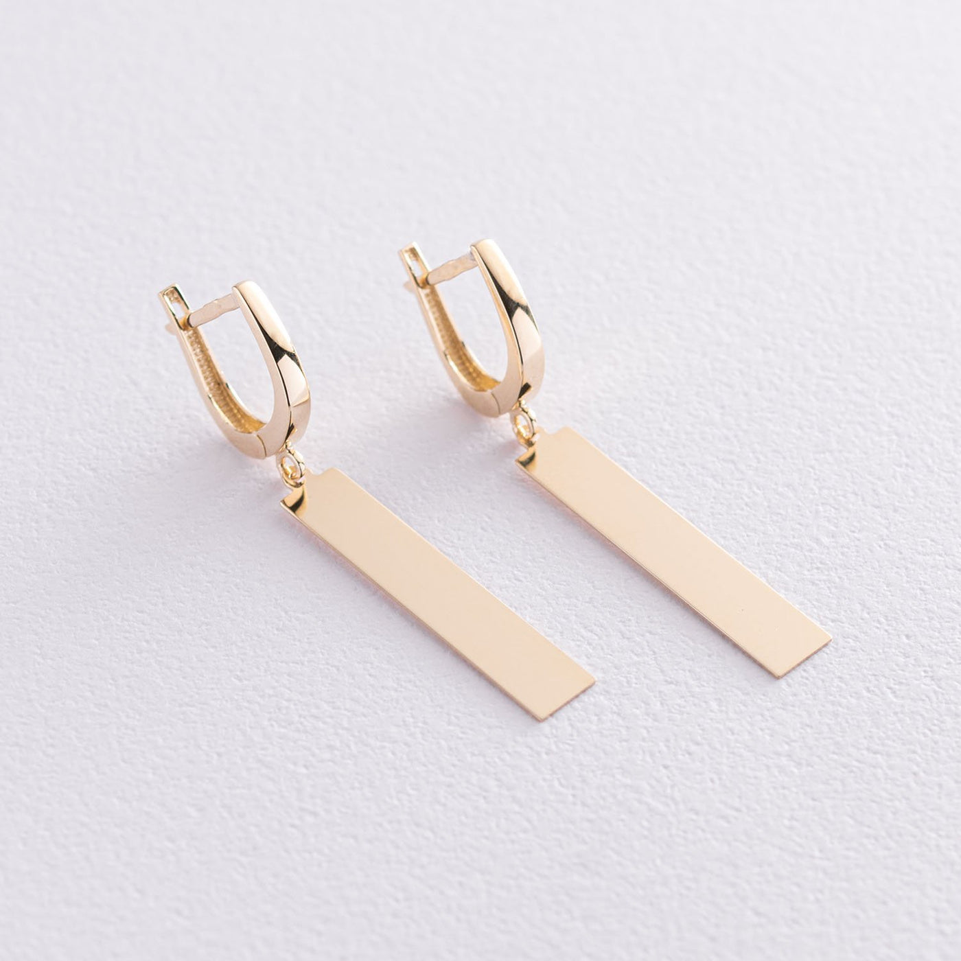 Gold leverback earrings