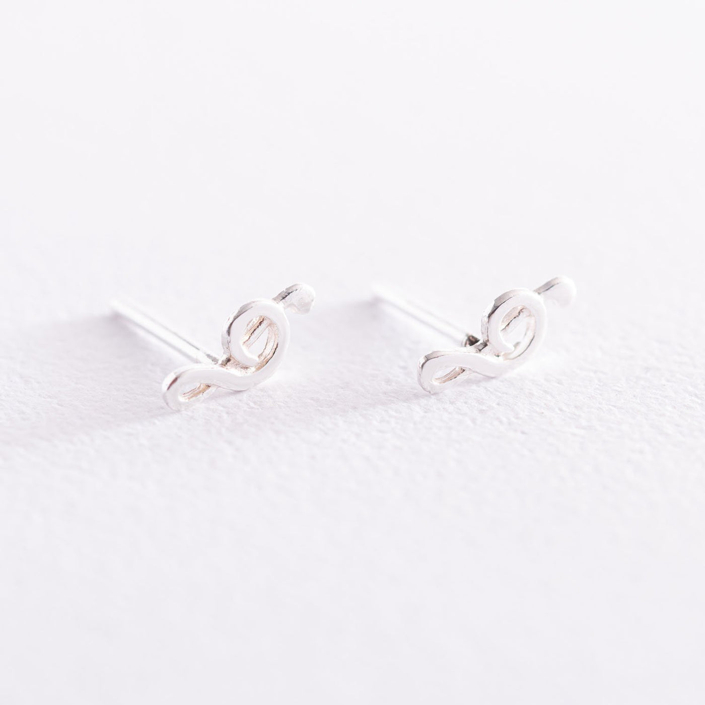 Silver Treble clef stud earrings