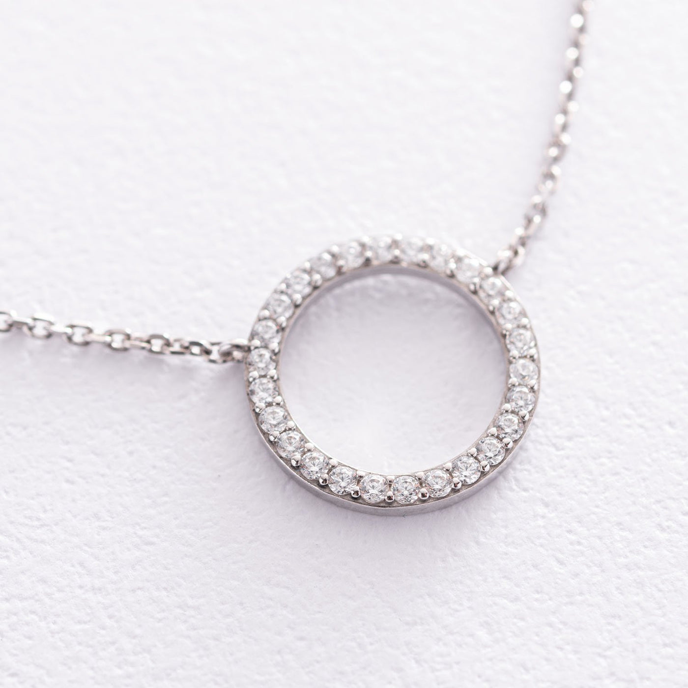 Silver circle necklace with cubic zirconia