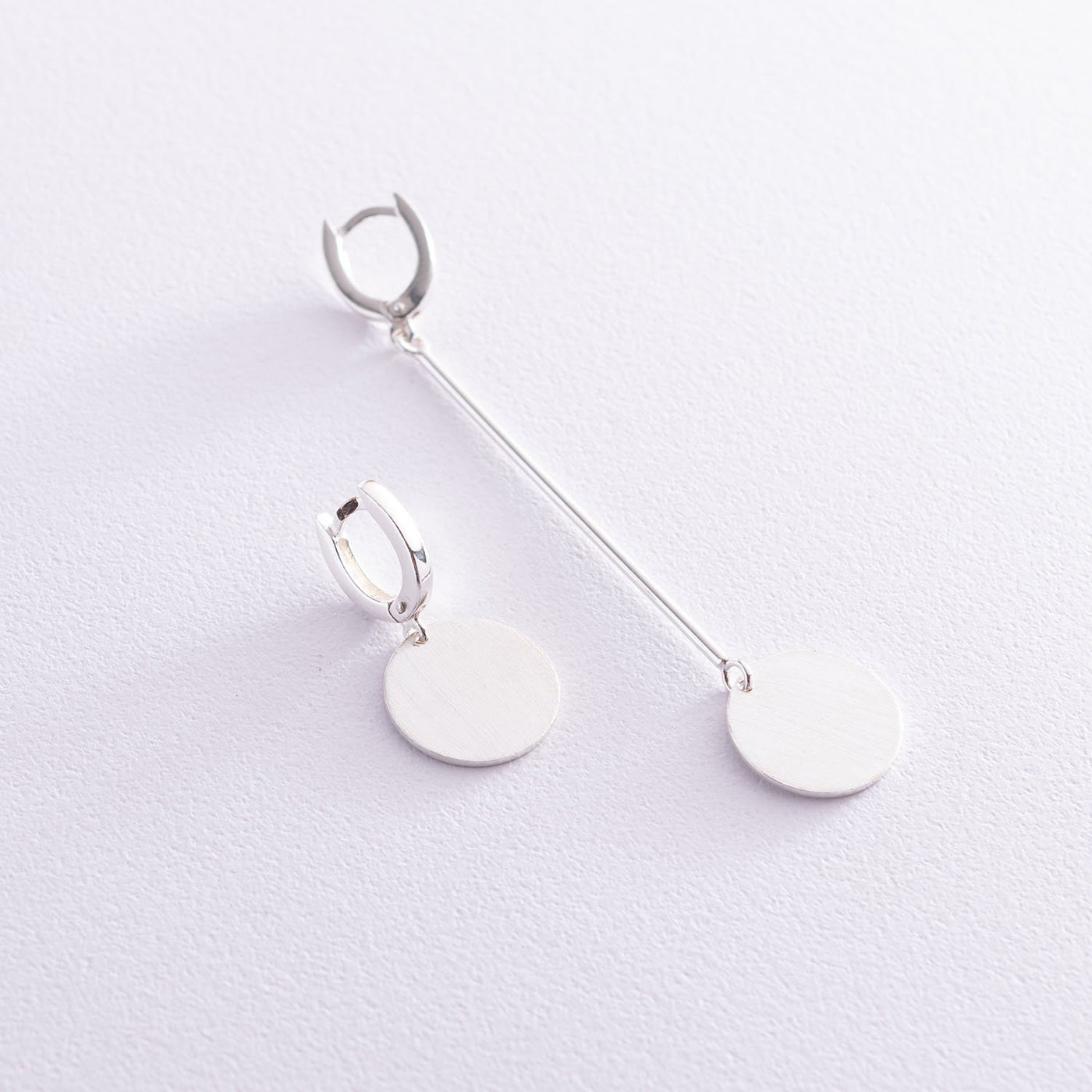 Silver asymmetrical earrings