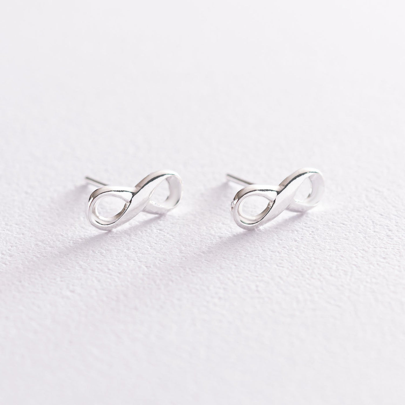 Silver stud earrings Infinity