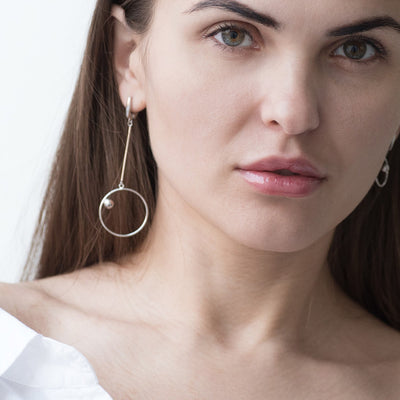 Silver asymmetrical earrings