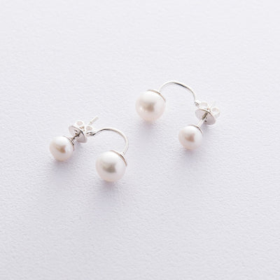 Silver stud earrings with pearls