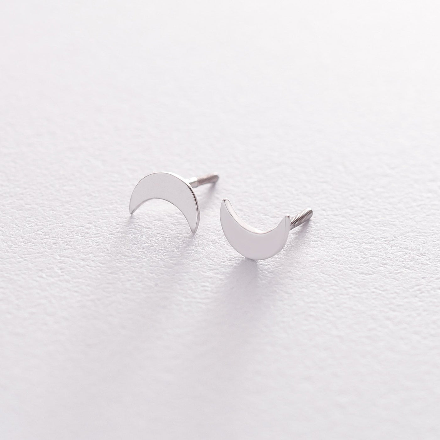 Moon gold stud earrings