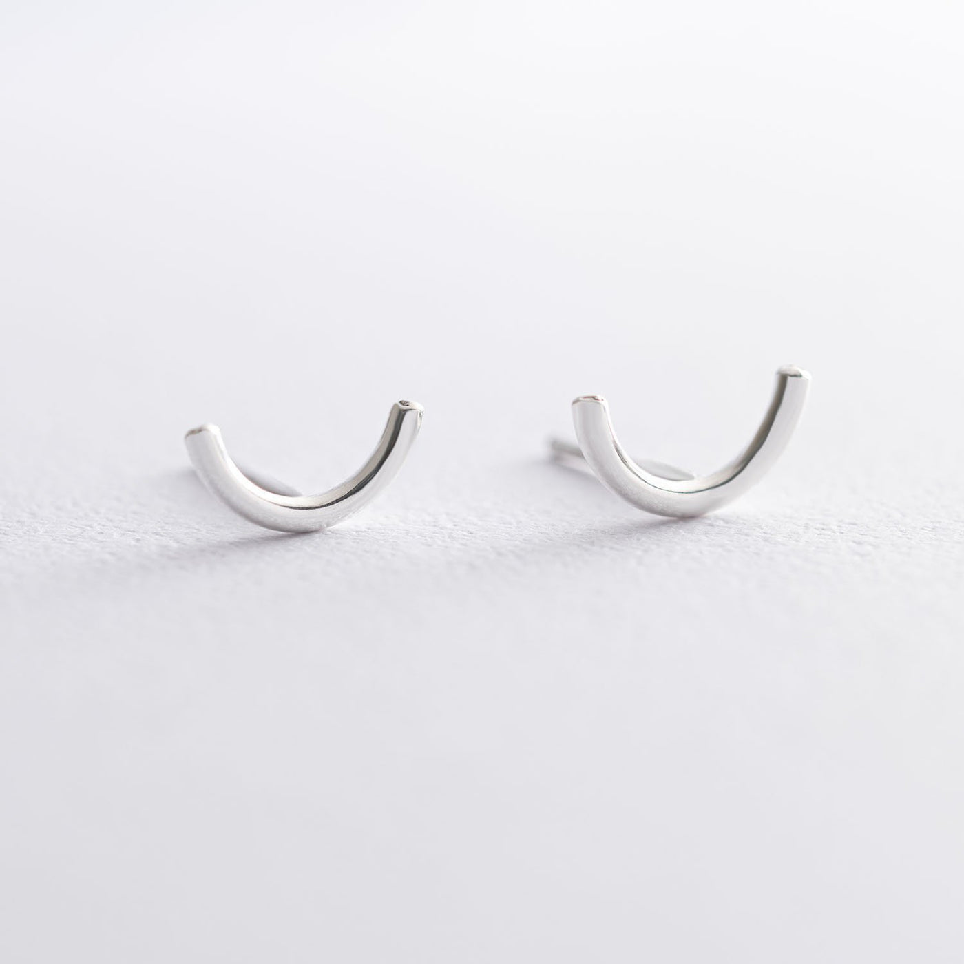 Silver arc stud earrings