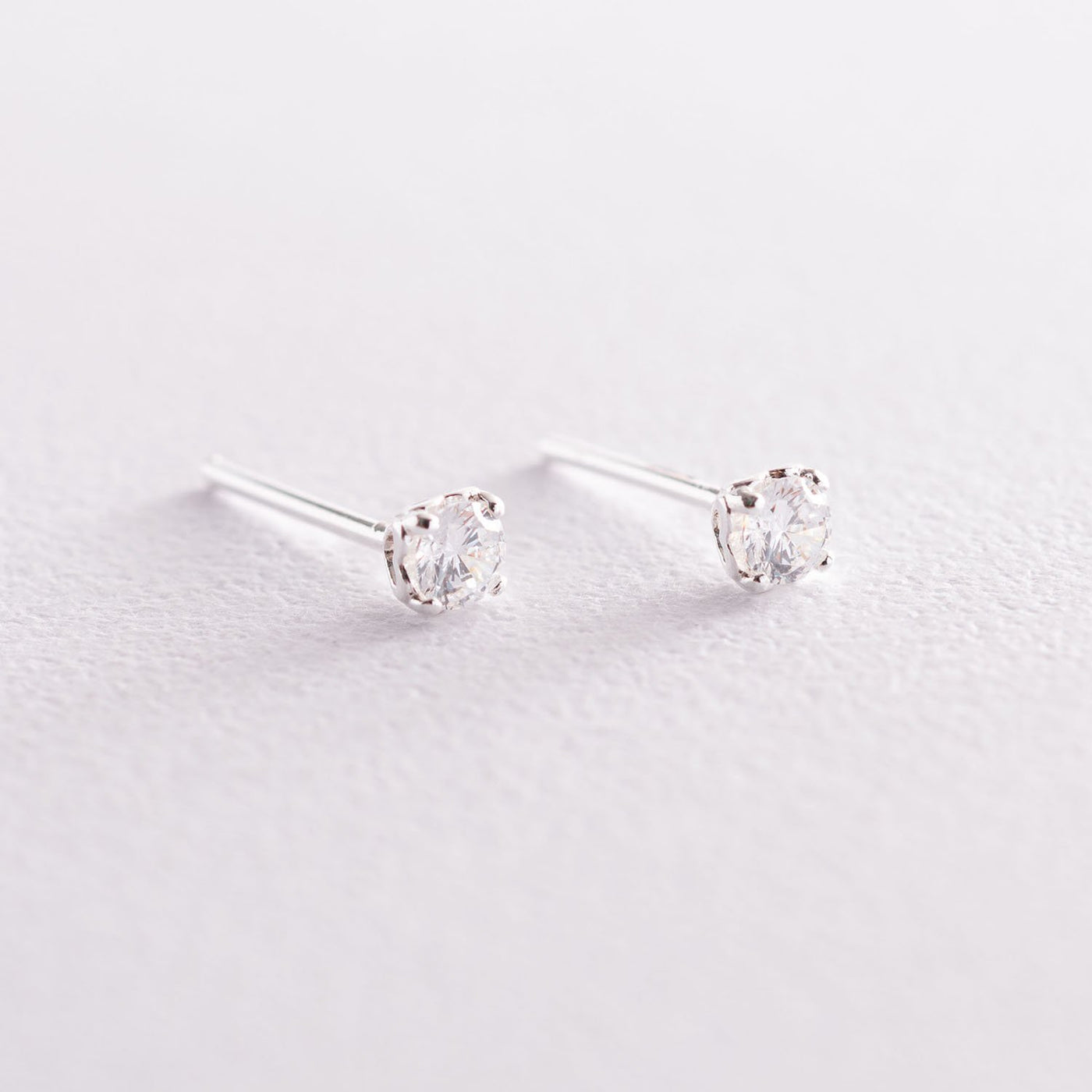 Silver heart stud earrings with cubic zirconia