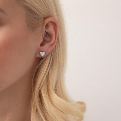 Gold heart stud earrings with opal