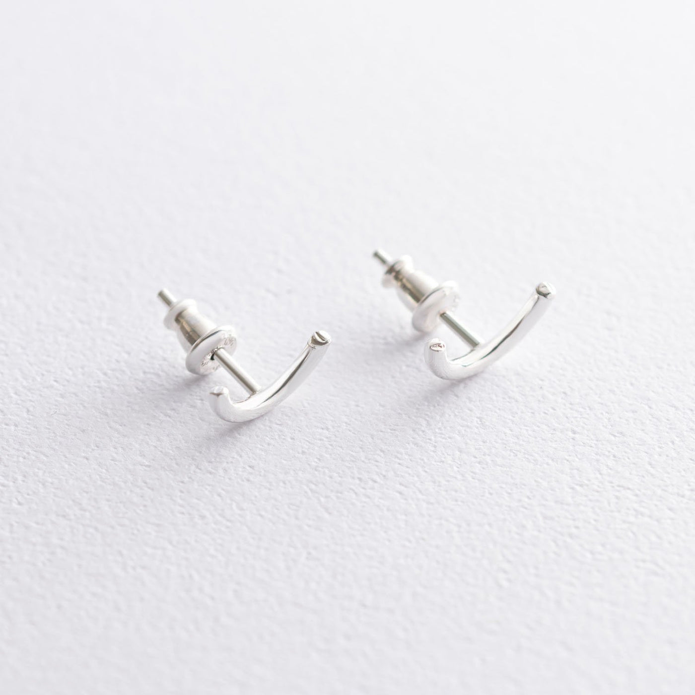 Silver arc stud earrings