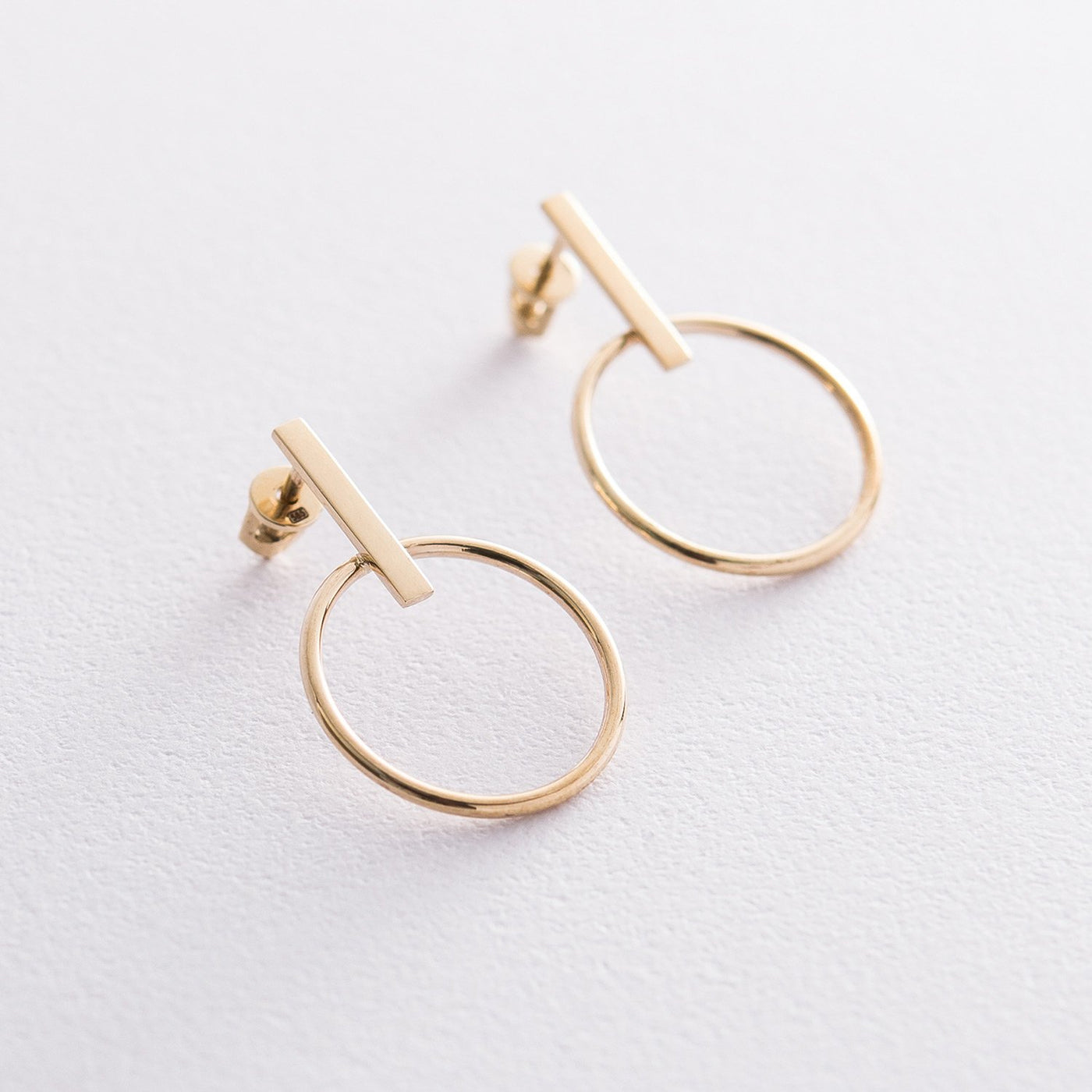 Gold stud earrings Confidence