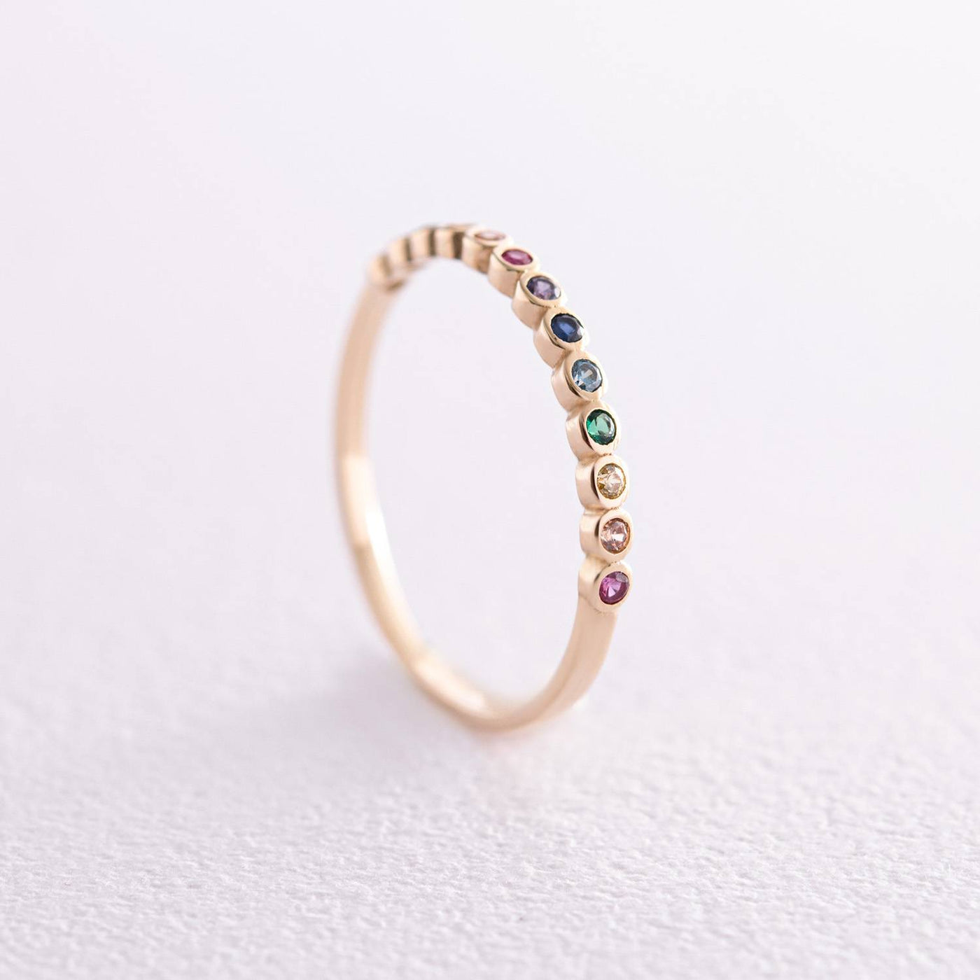 Gold ring with multi-colored cubic zirconia