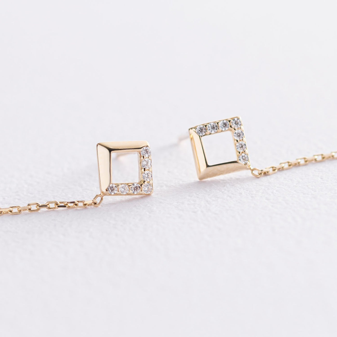 Gold chain diamond shape earrings with cubic zirconia