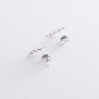 Silver stud leaves earrings