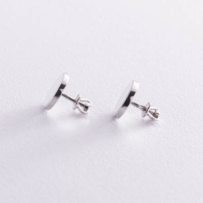 Silver stud earrings with white enamel