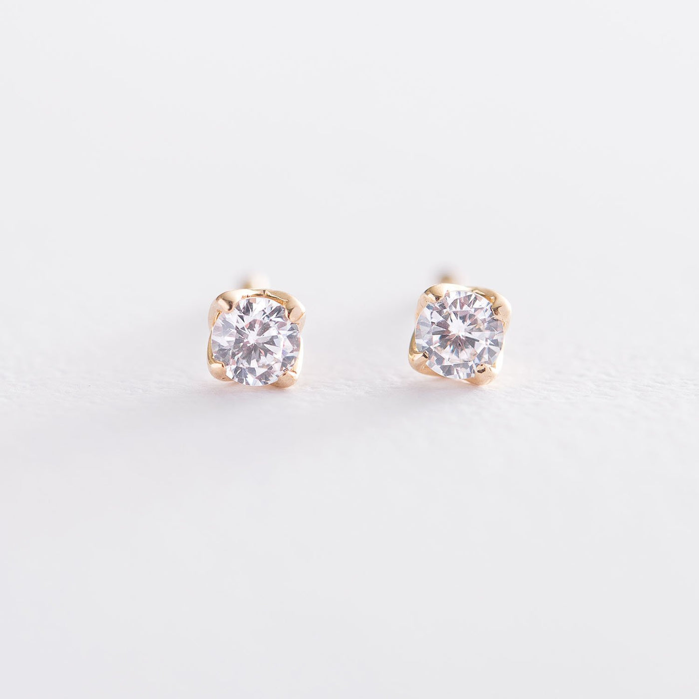 Gold stud earrings with cubic zirconia