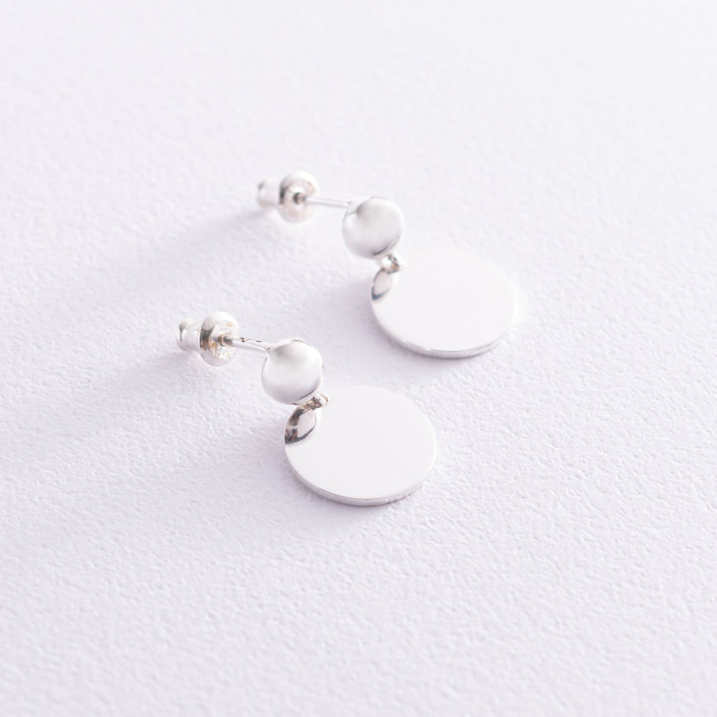 Silver coin stud earrings