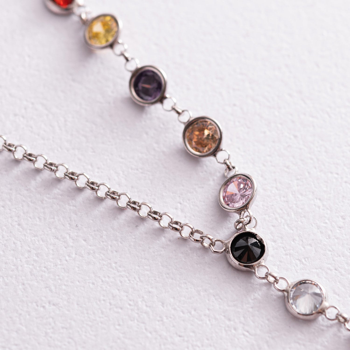 Silver tie necklace with multicolored cubic zirconia