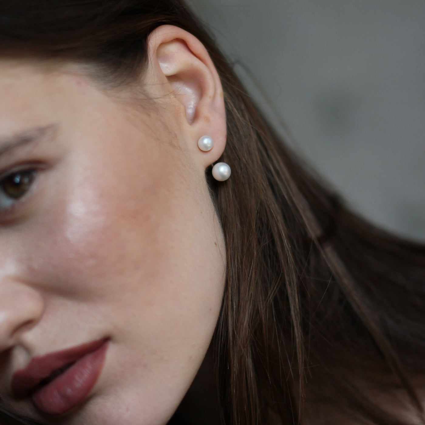 Silver stud earrings with pearls