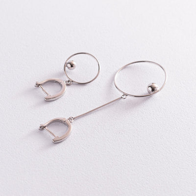 Silver asymmetrical earrings