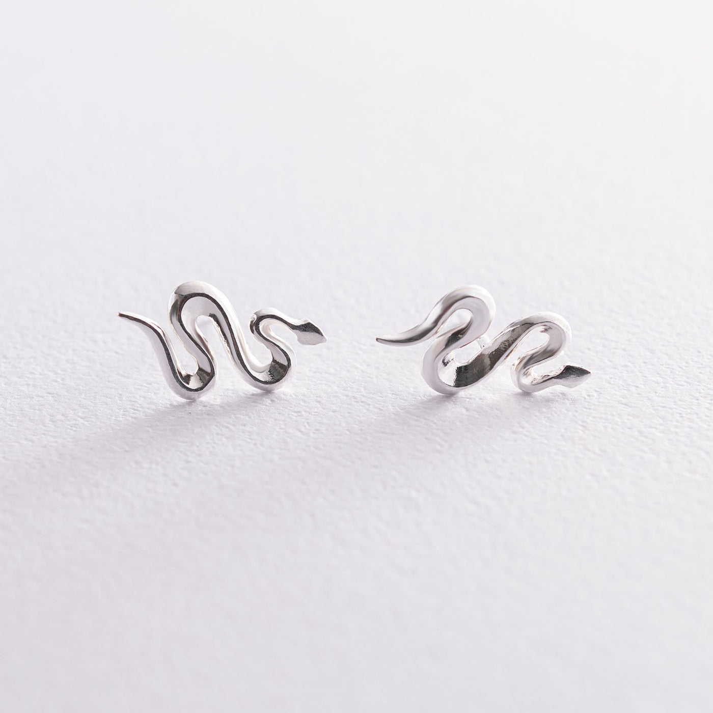 Silver snake stud earrings