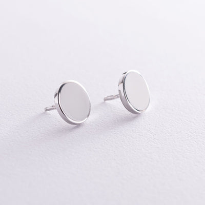 Silver stud earrings with white enamel