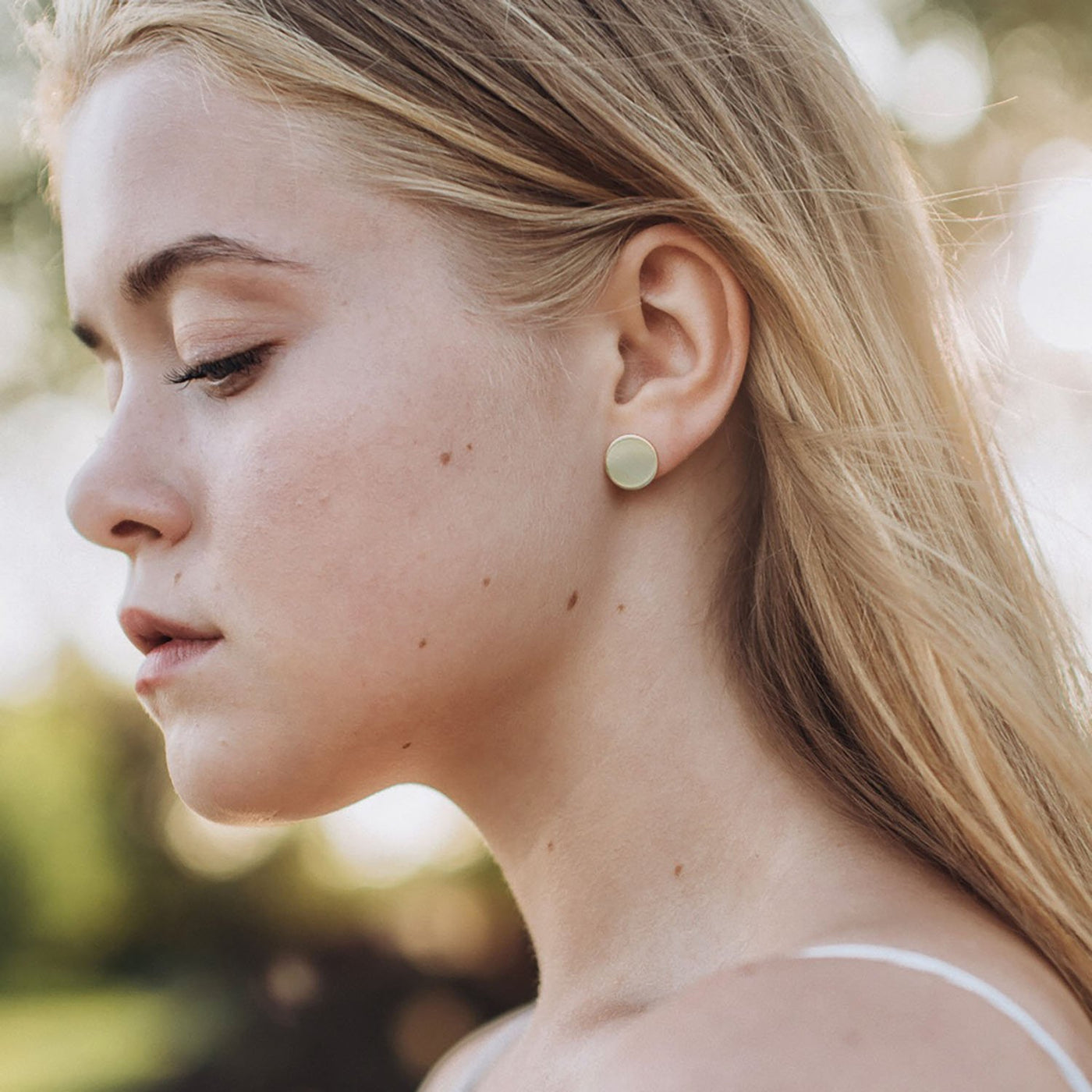 Gold stud earrings