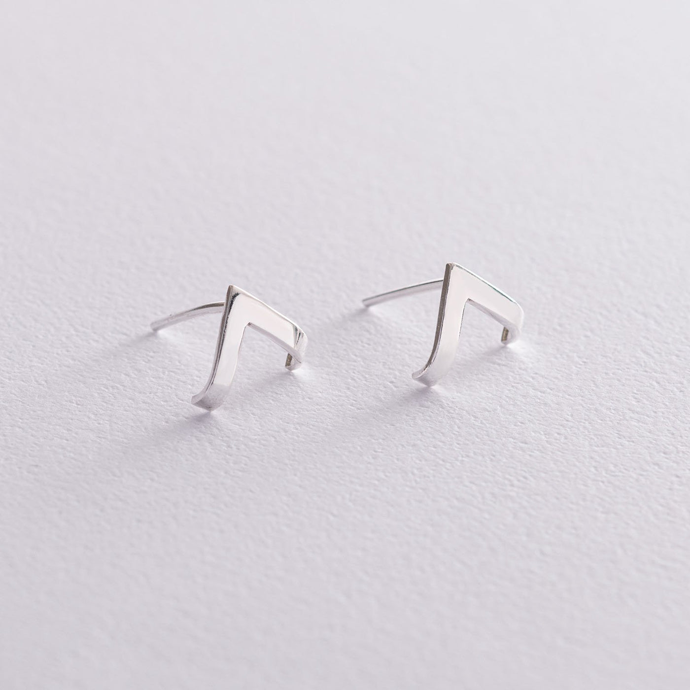 Silver stud earrings Accent