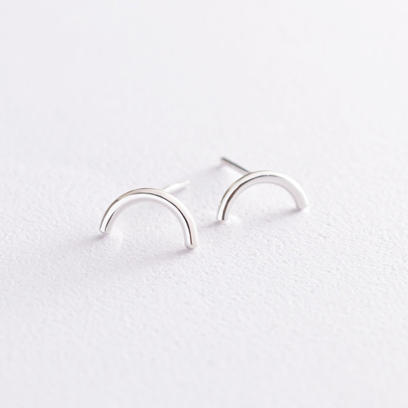 Silver arc stud earrings