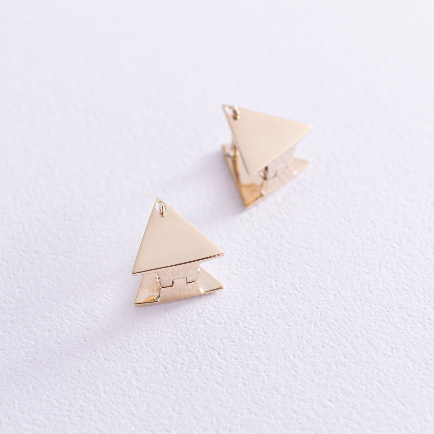 Yellow gold triangle stud earrings