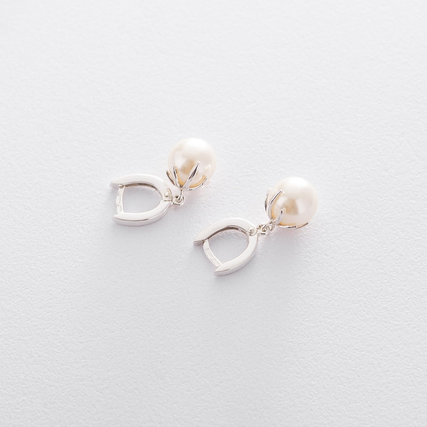 Silver earrings with imitation pearls