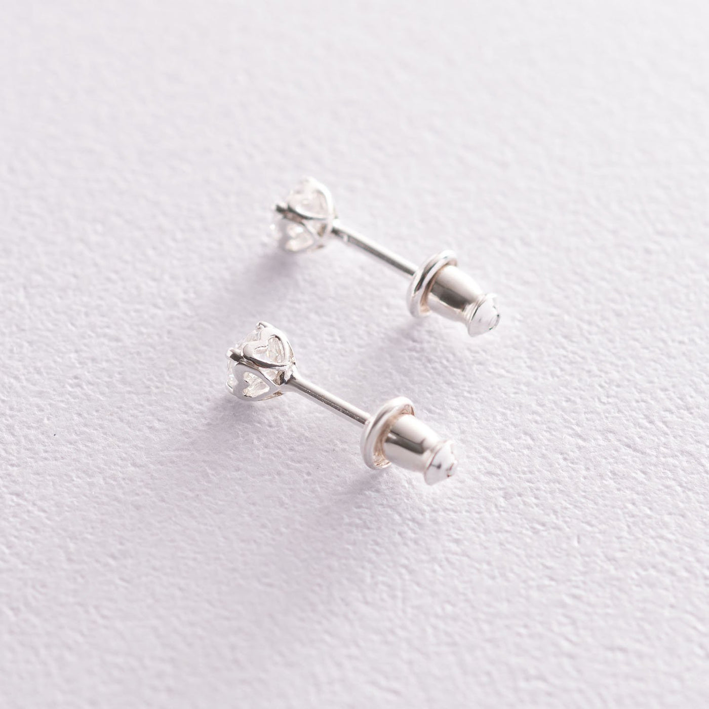 Silver heart stud earrings with cubic zirconia