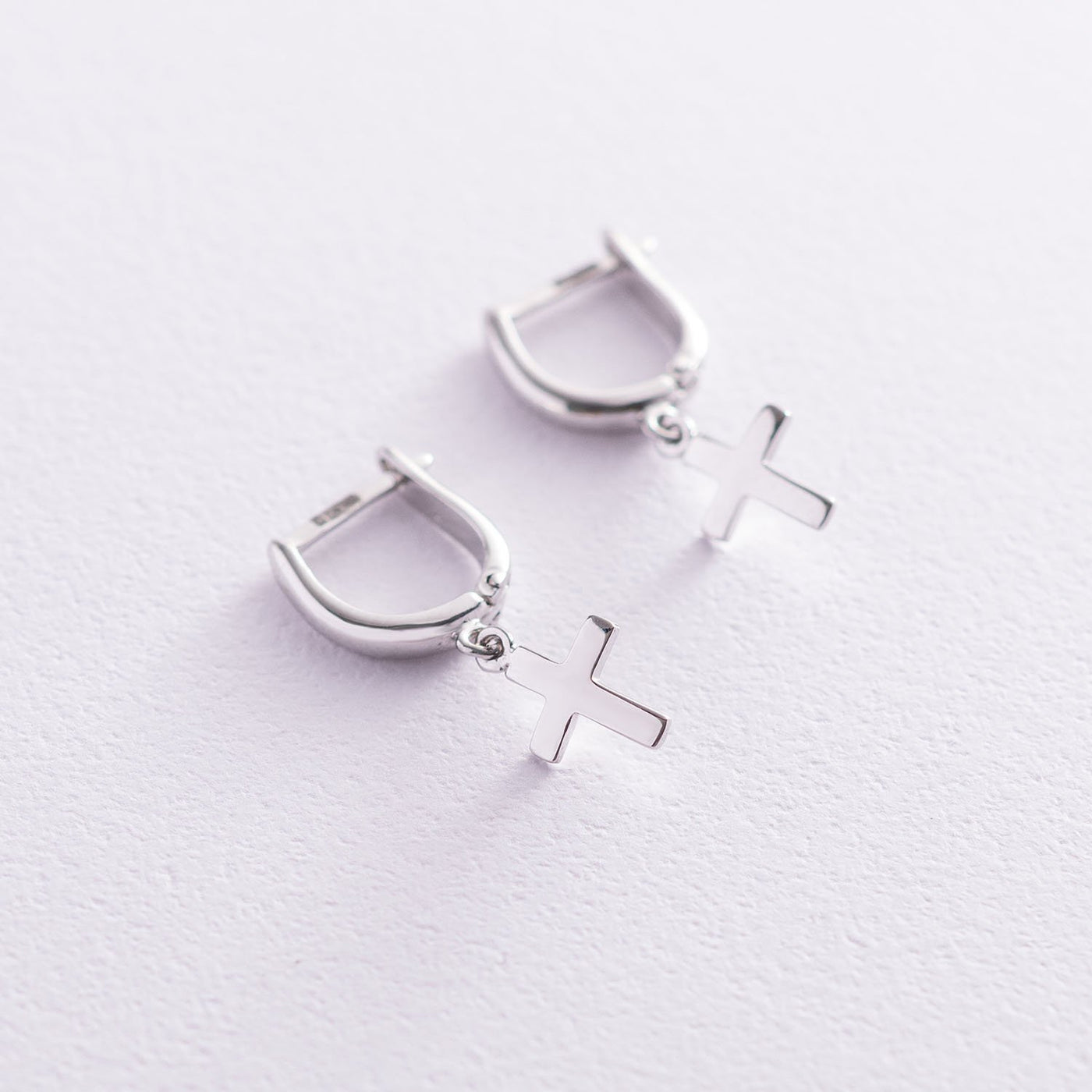 White gold cross earrings