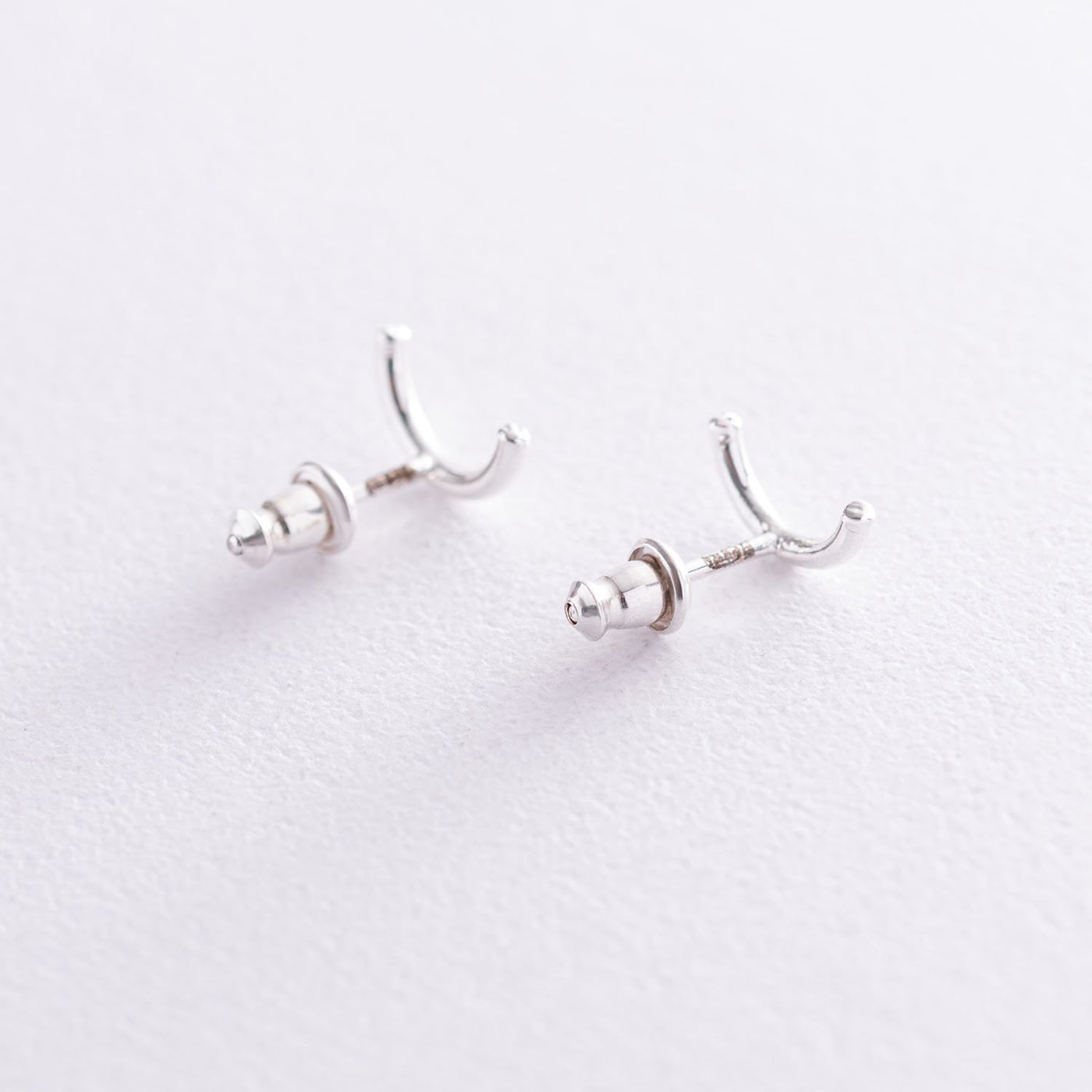 Silver arc stud earrings