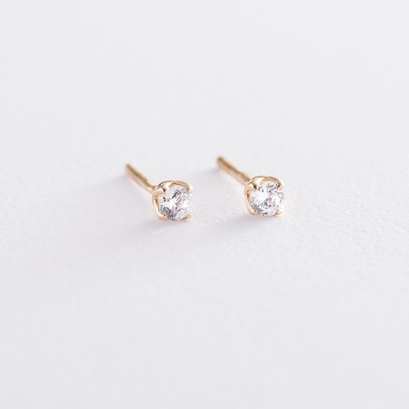 Gold stud earrings with cubic zirconia