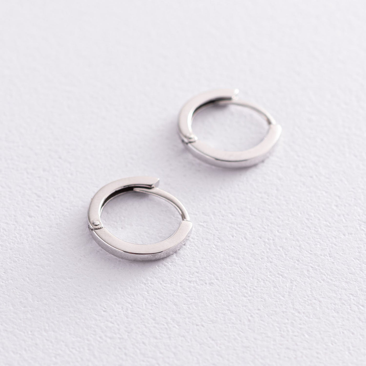 White gold hoop earrings